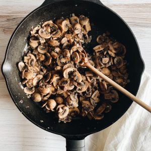 Frying pan with healthy sauteed balsamic mushrroms