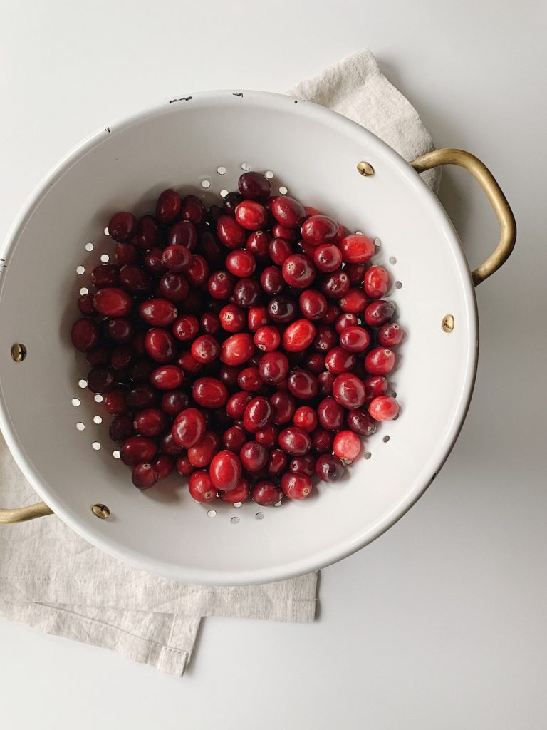 colander full of fresh cranberries