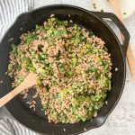pan of pea and leek greens risotto
