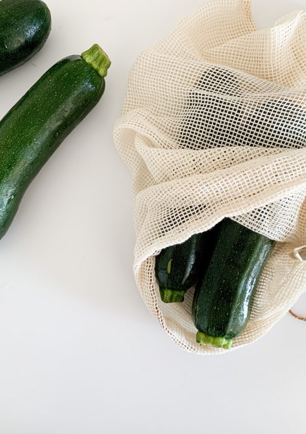 fresh zucchini in produce bag