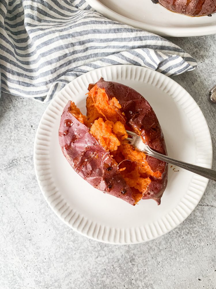 plate with a baked sweet potato