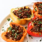 A plate of colorful stuffed peppers.