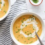 bowls of chicken corn chowder with cashew cream and chives
