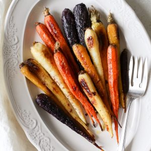 serving platter with maple and miso glazed roasted carrots