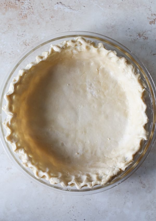 Dairy-free pie crust pressed into a pie pan.