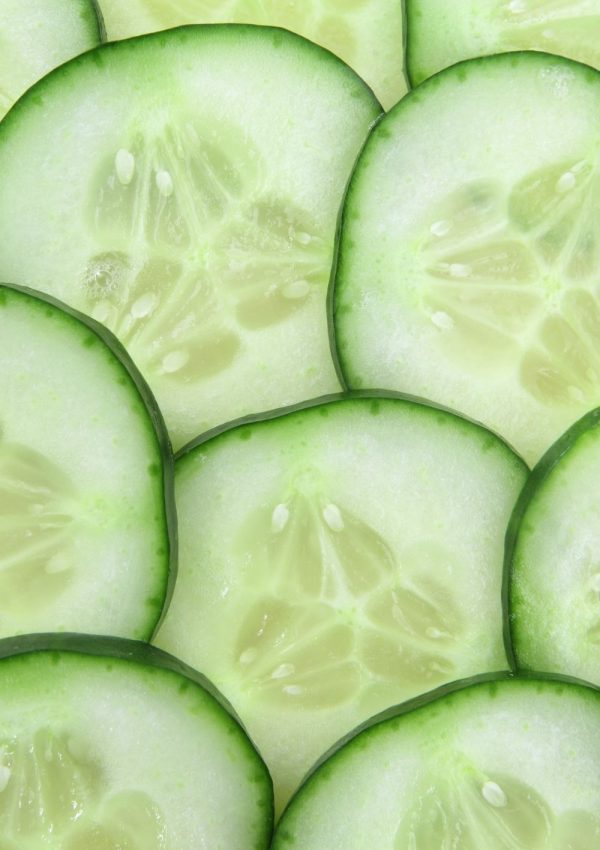 Overlapping slices of fresh cucumber.
