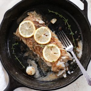 A lemon butter cod fish in a browned butter sauce.