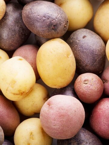 Red, gold, and purple potatoes.